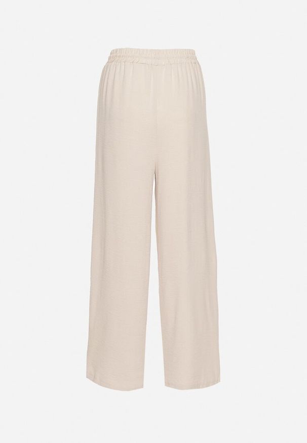 Born2be - Beżowe Spodnie z Wiskozą o Szerokim Kroju ze Ściągaczem w Talii Lavirre. Okazja: na co dzień. Kolor: beżowy. Materiał: wiskoza. Styl: klasyczny, casual, wizytowy