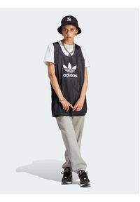 Adidas - adidas Spodnie dresowe Essentials Fleece IA6432 Szary Regular Fit. Kolor: szary. Materiał: bawełna