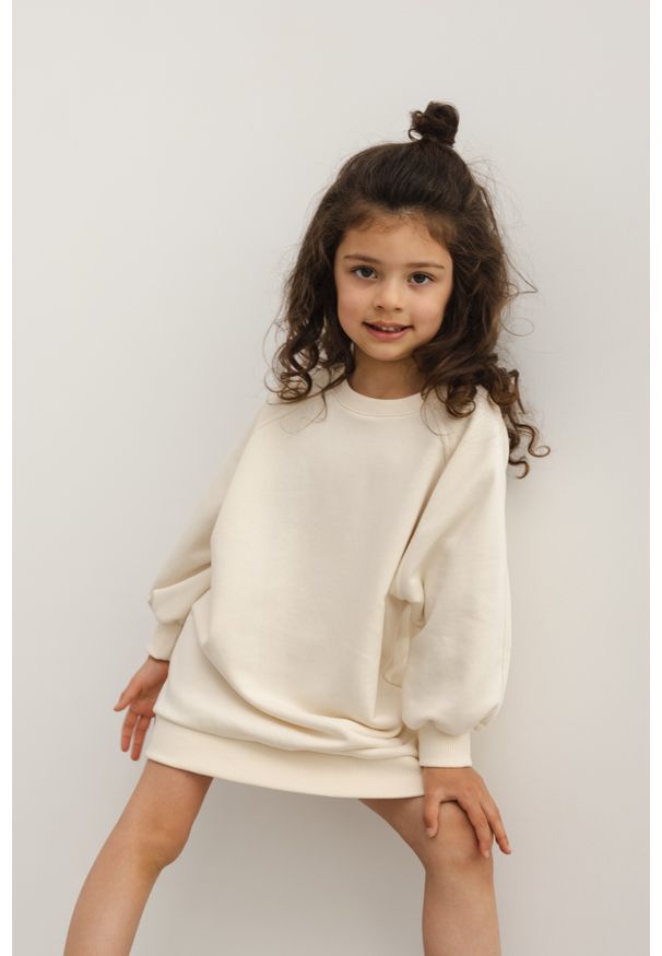 Marsala - MINI sukienka/tunika z dzianiny w kolorze BRIGHT BEIGE -DEXTER-80-86 (12-18). Kolor: beżowy. Materiał: dzianina. Długość rękawa: długi rękaw. Wzór: gładki. Typ sukienki: sportowe, proste. Styl: sportowy, klasyczny. Długość: mini
