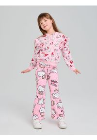 Sinsay - Spodnie Hello Kitty - różowy. Kolor: różowy. Wzór: motyw z bajki