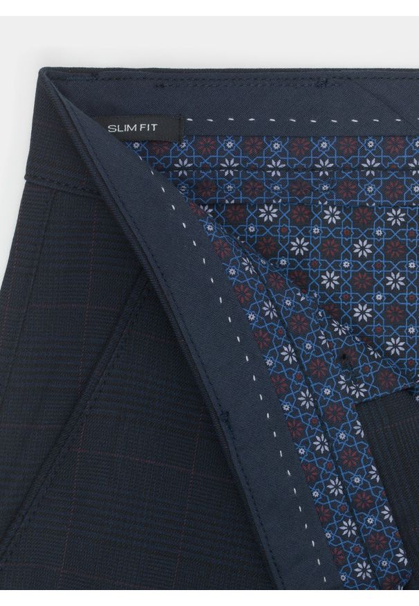 Pako Lorente - PAKO LORENTE – Granatowe spodnie męskie NIMA w subtelną kratę P000B-WX-214-G. Kolor: niebieski. Długość: długie. Styl: elegancki