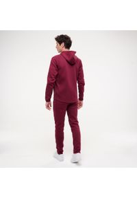 Decathlon - Spodnie dresowe męskie Puma Active Gym & Pilates. Kolor: czerwony. Materiał: dresówka. Sport: joga i pilates