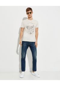 Alexander McQueen - ALEXANDER MCQUEEN - Granatowe jeansy z przetarciami. Kolor: niebieski #2