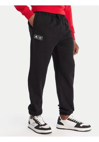 Kappa Spodnie dresowe Olmos 311M2TW Czarny Regular Fit. Kolor: czarny. Materiał: bawełna #1