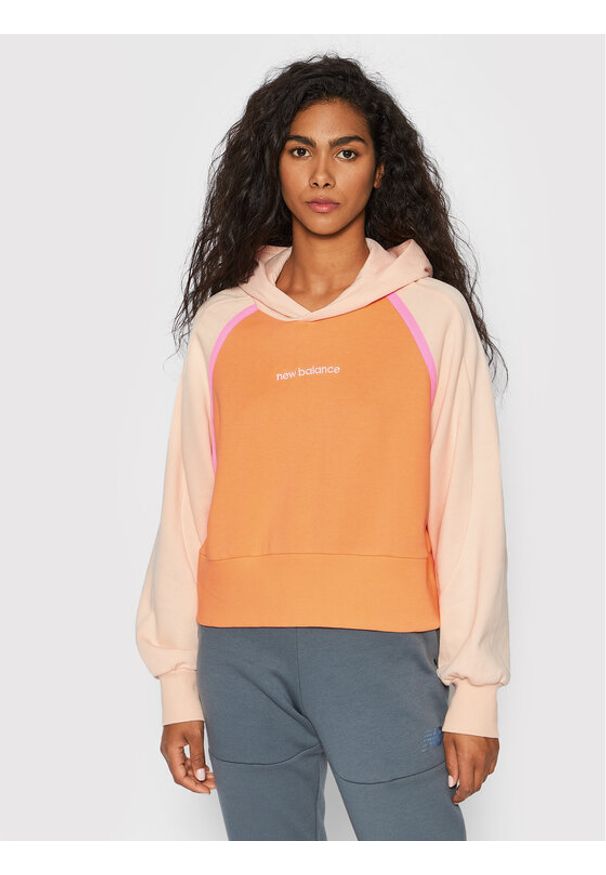 New Balance Bluza WT21501 Pomarańczowy Relaxed Fit. Kolor: pomarańczowy. Materiał: bawełna