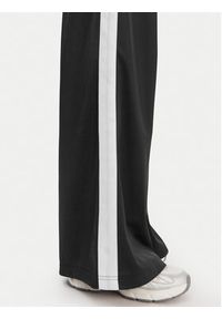 Reebok Spodnie dresowe Dianne RK25512CCW Czarny Relaxed Fit. Kolor: czarny. Materiał: syntetyk #3