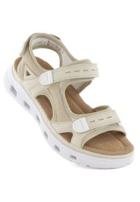 Komfortowe sandały damskie na rzepy beżowe Rieker 64074-60. Zapięcie: rzepy. Kolor: beżowy. Materiał: skóra ekologiczna