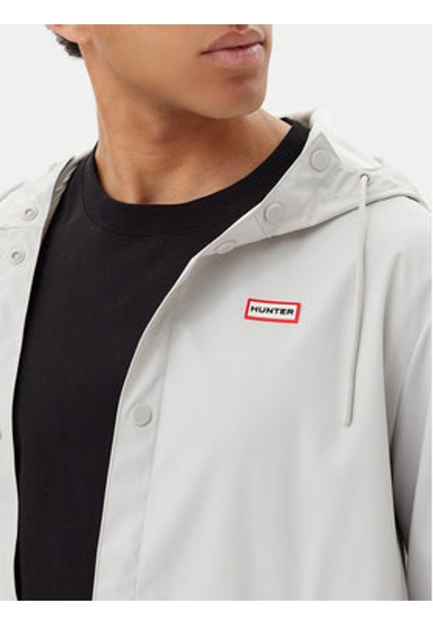 Hunter Kurtka przeciwdeszczowa Izzy Unisex HARU0012251 Szary Regular Fit. Kolor: szary. Materiał: syntetyk