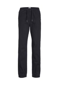 Jack&Jones Junior Spodnie dresowe 12236801 Czarny Comfort Fit. Kolor: czarny. Materiał: bawełna, dresówka