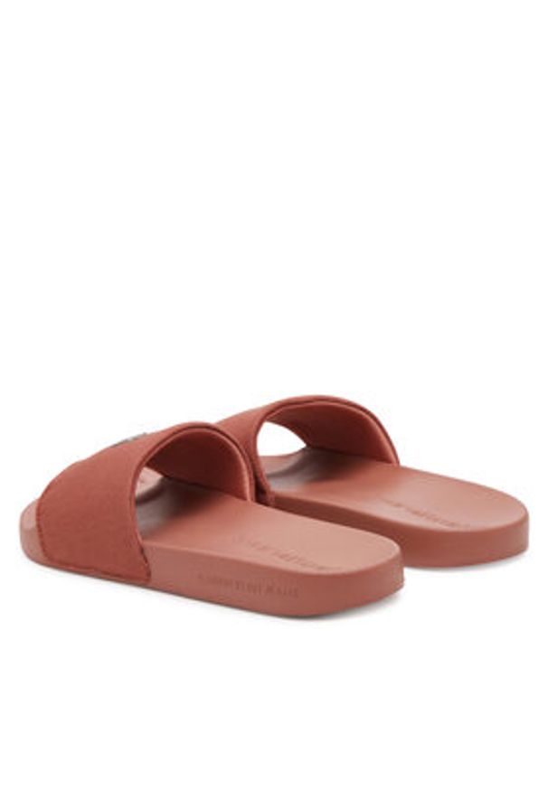 Calvin Klein Jeans Klapki Slide Monogram Hardware YW0YW01713 Koralowy. Kolor: pomarańczowy. Materiał: materiał