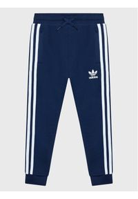 Adidas - adidas Spodnie dresowe 3-Stripes HK0353 Granatowy Standard Fit. Kolor: niebieski. Materiał: bawełna #1