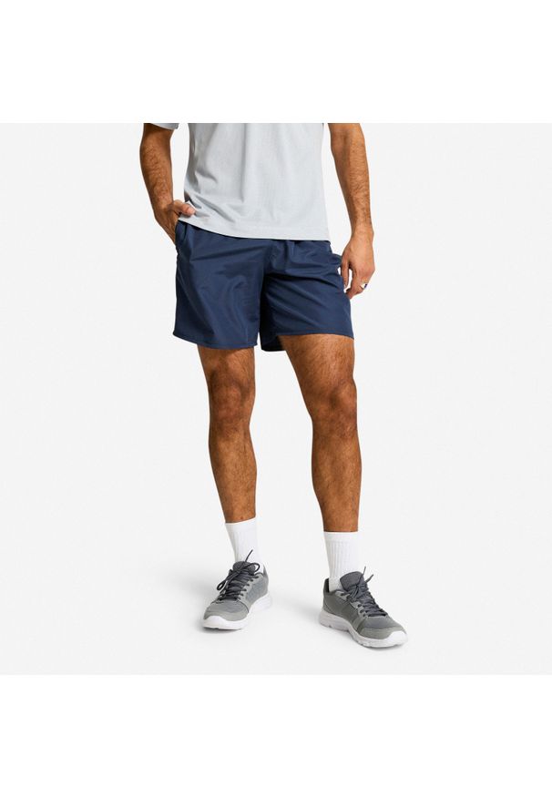 DOMYOS - Spodenki fitness cardio męskie Domyos. Kolor: niebieski. Materiał: poliester, materiał. Sport: fitness