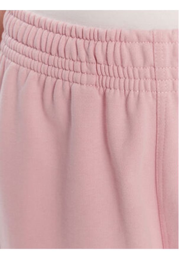 Calvin Klein Jeans Spodnie dresowe Moologo LV047B235G Różowy Regular Fit. Kolor: różowy. Materiał: bawełna