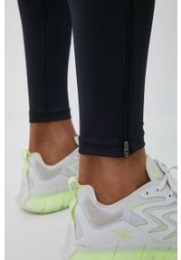 New Balance legginsy do biegania Accelerate męskie kolor czarny gładkie. Kolor: czarny. Materiał: materiał. Wzór: gładki