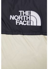 The North Face kurtka puchowa W 1996 RTRO NPTS JKT damska kolor beżowy zimowa. Okazja: na co dzień. Typ kołnierza: kaptur. Kolor: beżowy. Materiał: puch. Sezon: zima. Styl: casual