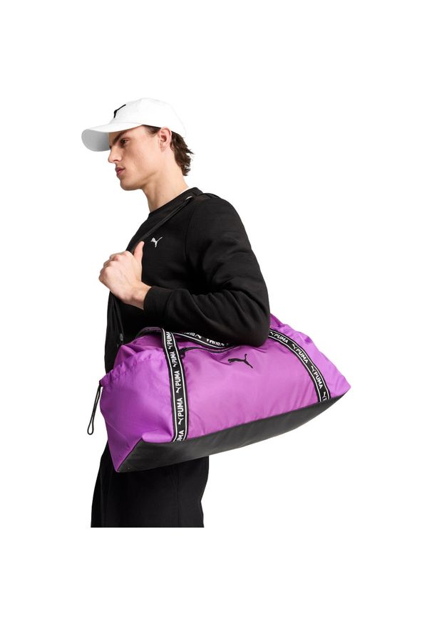 Torba Puma At Ess Sports Bag. Kolor: fioletowy. Materiał: poliester, materiał. Sport: fitness