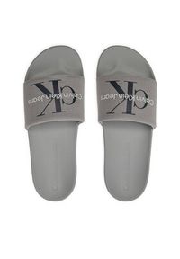 Calvin Klein Jeans Klapki Slide Monogram Co YM0YM00061 Szary. Kolor: szary. Materiał: materiał