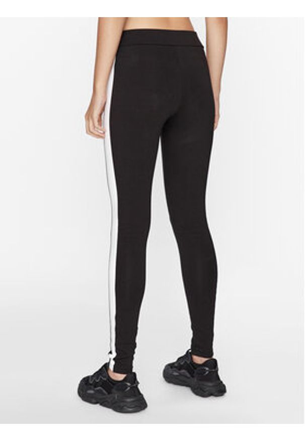 Puma Legginsy Iconic T7 530080 Czarny Tight Fit. Kolor: czarny. Materiał: bawełna