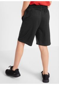 Spodnie sportowe bonprix czarny z nadrukiem. Kolor: czarny. Wzór: nadruk. Styl: sportowy #3