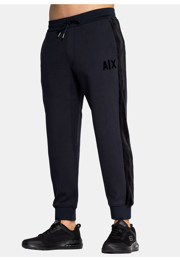 Spodnie dresowe męskie granatowe Armani Exchange 6KZPFR ZJ6LZ 4520. Kolor: niebieski. Materiał: dresówka. Sport: turystyka piesza