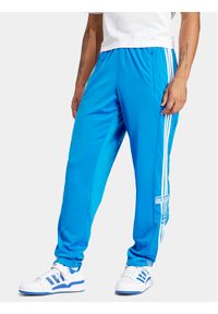 Adidas - adidas Spodnie dresowe adicolor Classics Adibreak IM8224 Niebieski Regular Fit. Kolor: niebieski. Materiał: syntetyk #1