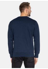 Bluza męska Champion Organic Cotton Blend Script Logo (216471-BS538). Kolor: niebieski. Materiał: materiał. Styl: sportowy, elegancki