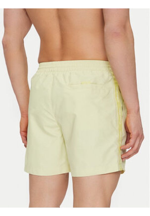 Calvin Klein Swimwear Szorty kąpielowe KM0KM01109 Żółty Regular Fit. Kolor: żółty. Materiał: syntetyk