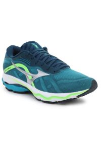 Buty Mizuno Wave Ultima 13 M J1GC221805 niebieskie. Kolor: niebieski. Materiał: guma, syntetyk, materiał. Szerokość cholewki: normalna. Model: Mizuno Wave. Sport: fitness