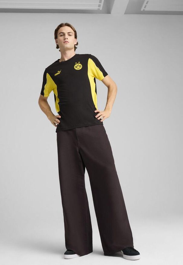 Puma - Męska koszulka Borussia Dortmund ftblARCHIVE PUMA Black Faster Yellow. Kolor: żółty, wielokolorowy, czarny. Wzór: aplikacja