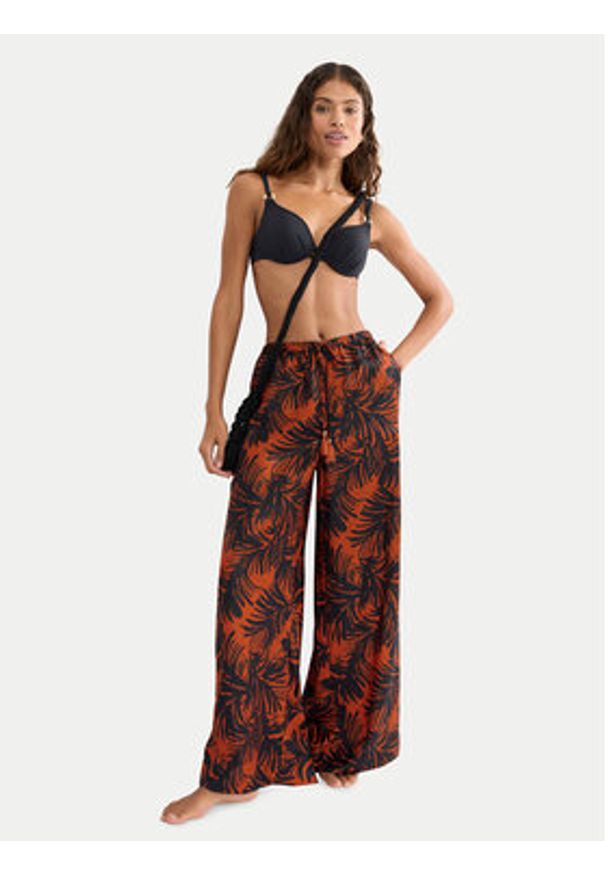 Triumph Spodnie materiałowe Summer 10227246 Brązowy Wide Leg. Kolor: brązowy. Materiał: syntetyk