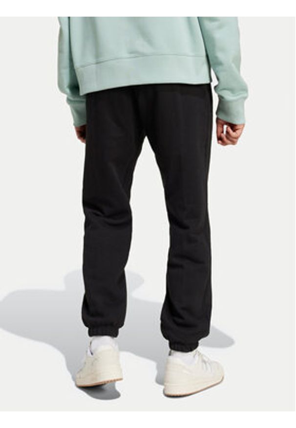 Adidas - adidas Spodnie dresowe Premium Essentials IY2245 Czarny Loose Fit. Kolor: czarny. Materiał: bawełna