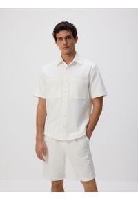 Reserved - Szorty regular fit - złamana biel. Materiał: bawełna, dzianina #1