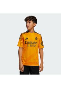 Adidas - Koszulka Real Madrid 24/25 Away Kids. Kolor: pomarańczowy. Materiał: materiał
