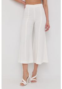 TwinSet - Twinset spodnie damskie kolor biały dzwony high waist. Stan: podwyższony. Kolor: biały. Materiał: tkanina