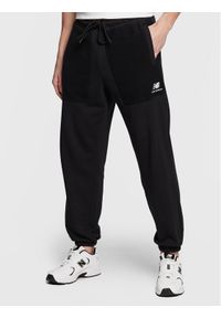 Spodnie dresowe New Balance. Kolor: czarny. Materiał: dresówka #1