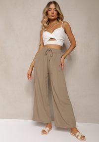 Renee - Ciemnobeżowe Bawełniane Spodnie Palazzo High Waist z Gumką w Pasie Gitanea. Okazja: na co dzień. Stan: podwyższony. Kolor: beżowy. Materiał: bawełna. Styl: elegancki, casual