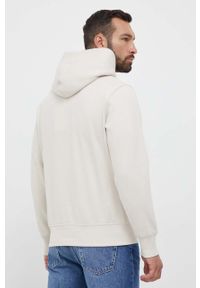 Calvin Klein Jeans bluza męska kolor beżowy z kapturem z nadrukiem. Typ kołnierza: kaptur. Kolor: beżowy. Materiał: bawełna. Wzór: nadruk #2