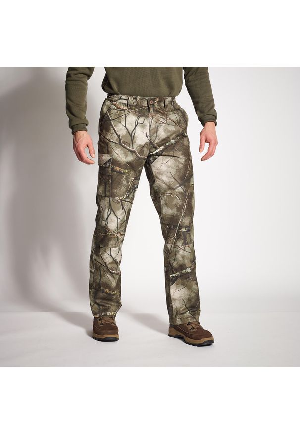SOLOGNAC - Spodnie myśliwskie Solognac 500 Warm wodoodporne camo treemetic. Kolor: wielokolorowy, brązowy, zielony. Materiał: materiał, tkanina, polar. Sport: outdoor