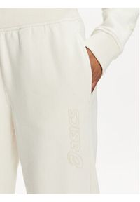 Asics Spodnie dresowe Logo 2032C844 Beżowy Regular Fit. Kolor: beżowy. Materiał: bawełna #3