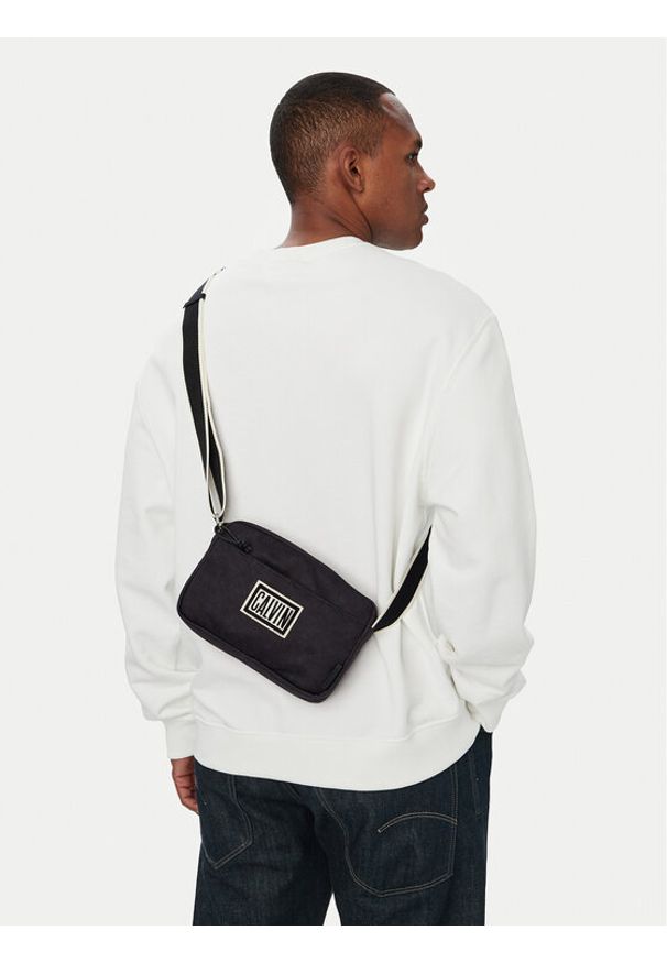 Calvin Klein Saszetka Ssnl Graphic Camera Bag LV04D3628G Czarny. Kolor: czarny. Materiał: materiał