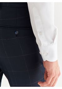 Pako Lorente - PAKO LORENTE – Granatowe spodnie garniturowe w kratę Windowpane. Kolor: niebieski. Materiał: wiskoza, poliester, elastan