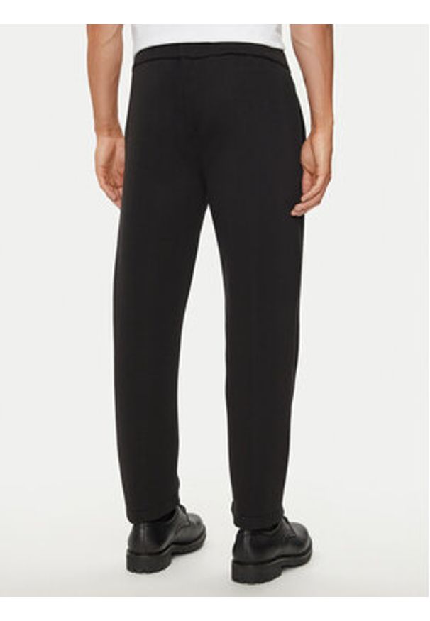 Calvin Klein Spodnie materiałowe K10K113661 Czarny Regular Fit. Kolor: czarny. Materiał: bawełna