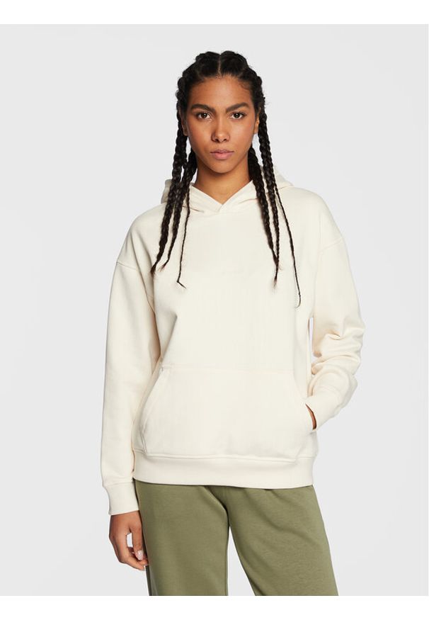 New Balance Bluza Athletics Nature WT23554 Écru Oversize. Materiał: bawełna