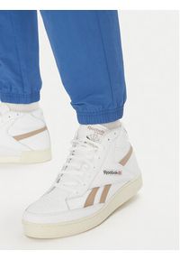 Reebok Spodnie dresowe 100215278 Niebieski Regular Fit. Kolor: niebieski. Materiał: syntetyk #5