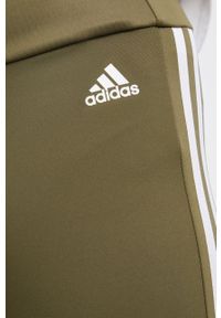 Adidas - adidas Legginsy GT0181 damskie kolor zielony gładkie. Stan: podwyższony. Kolor: zielony. Materiał: materiał. Wzór: gładki