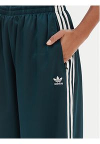 Adidas - adidas Spodnie dresowe adicolor Satin JV7511 Zielony Wide Leg. Kolor: zielony. Materiał: syntetyk #5