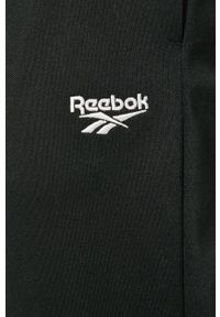 Reebok Classic - Spodnie. Kolor: czarny. Materiał: bawełna, poliester, dzianina. Wzór: gładki #3