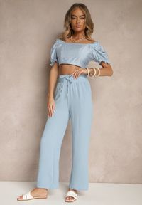 Renee - Jasnoniebieskie Szerokie Spodnie High Waist z Gumką w Pasie Savimirae. Okazja: na co dzień. Stan: podwyższony. Kolor: niebieski. Styl: casual, elegancki