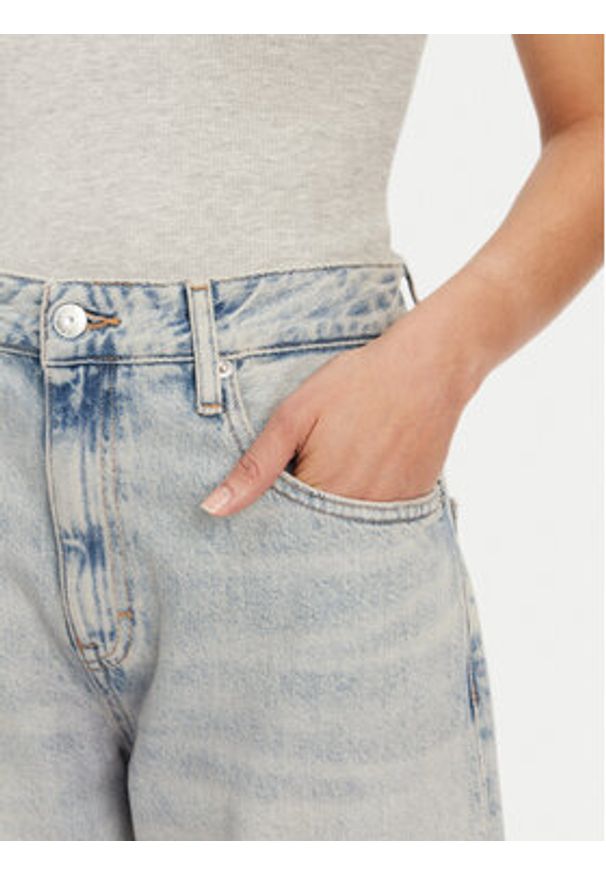 Tommy Jeans Szorty jeansowe Mia DW0DW20086 Niebieski Relaxed Fit. Kolor: niebieski. Materiał: bawełna