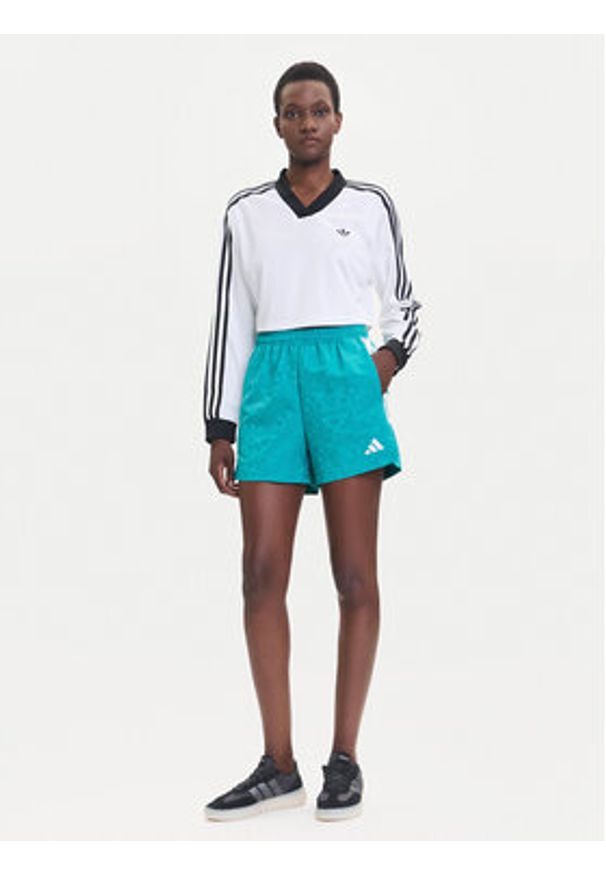 Adidas - adidas Szorty sportowe Tiro x Common Goal JL9208 Turkusowy Loose Fit. Kolor: turkusowy. Materiał: syntetyk